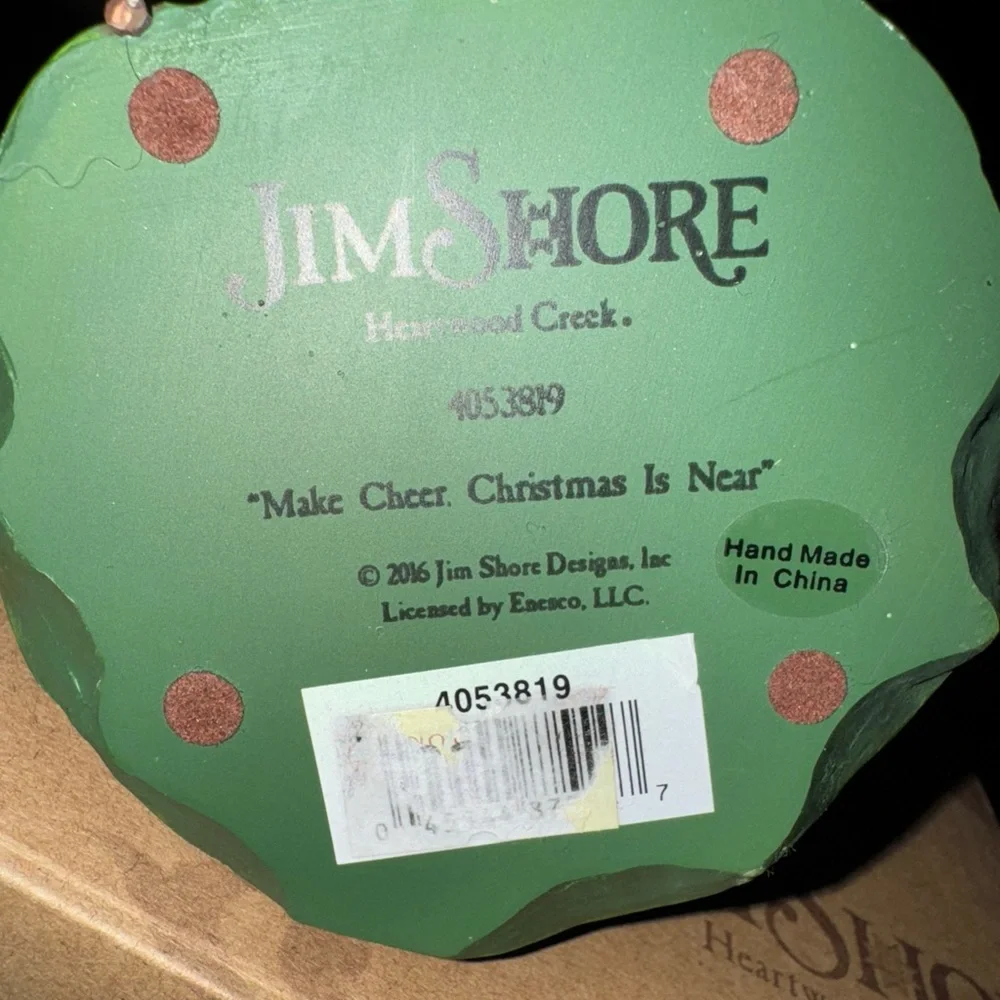 Jim Shore Santa Figurine with Star please look. Closely at pictures